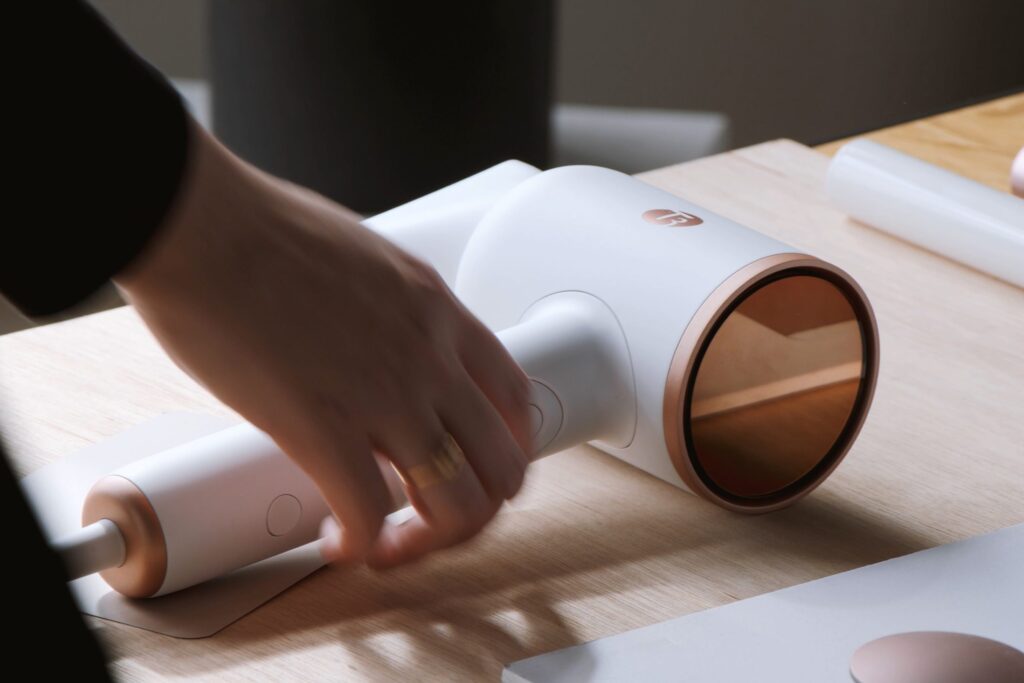 Lifestyle photograph of T3 hair dryer. Design and film by forpeople.