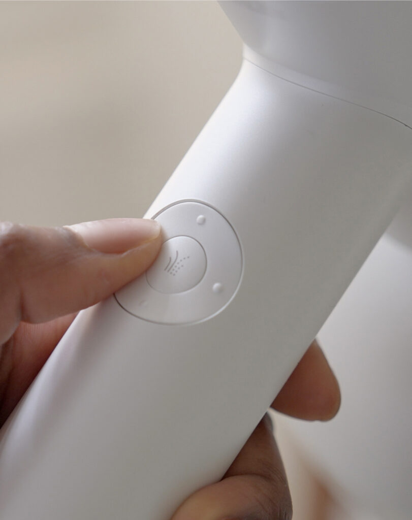 Close-up photograph of the T3 hair dryer product design. Product design and film by forpeople.