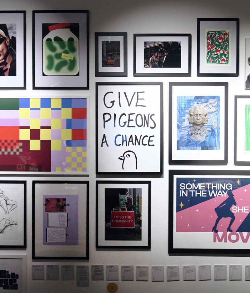 A photographic works wall at the private view. Film and design by forpeople.