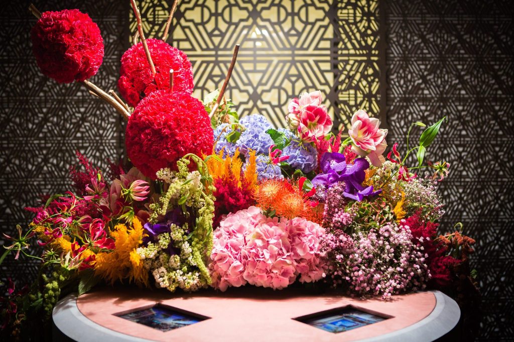 Regent-branded flower table, designed by forpeople as part of an immersive brand experience.