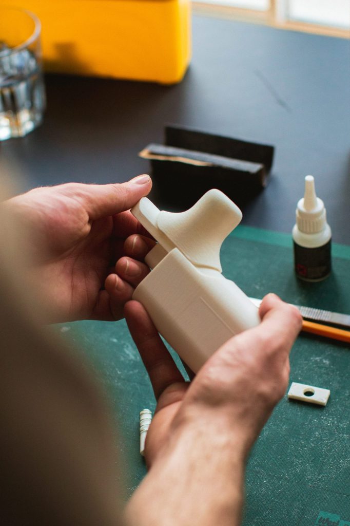 Photograph of one of our 3D designers prototyping a product interface.