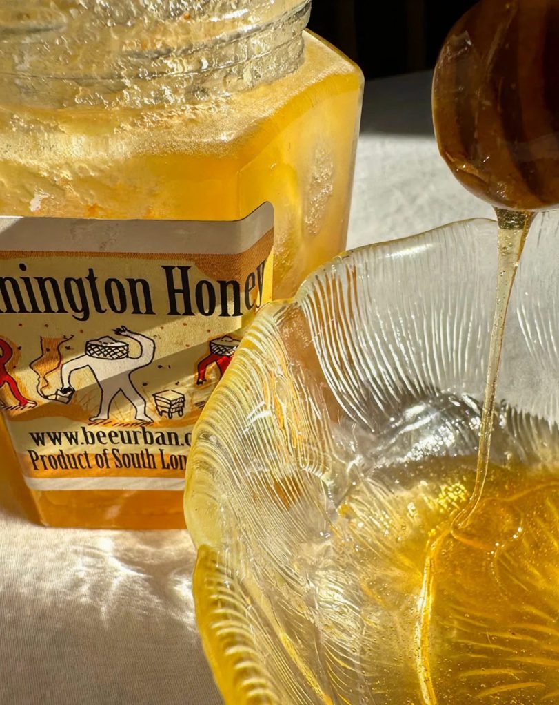 Photograph of bread and honey. Film and concept by forpeople.