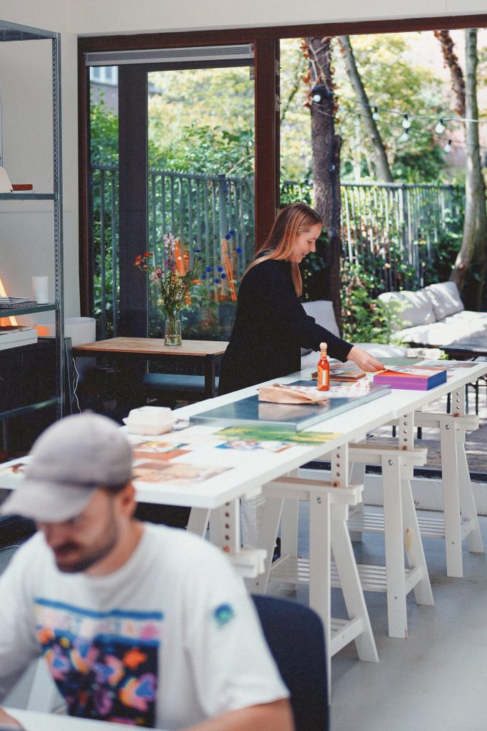 Photograph of Anete and Jeremie working together in the Amsterdam studio's workshop.