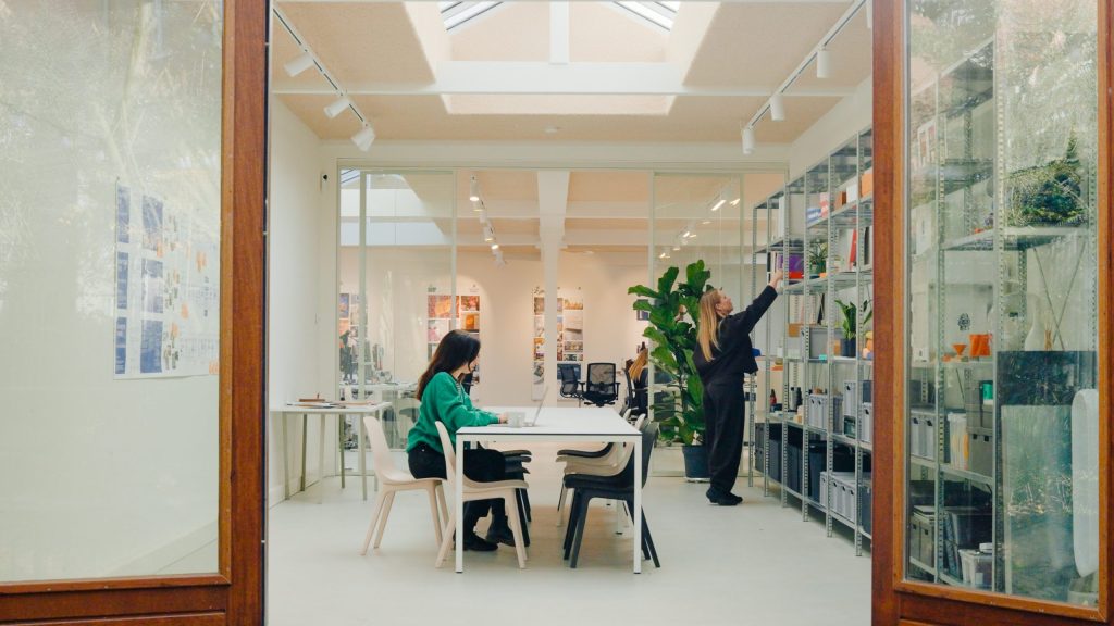 Photograph of our designers working in the workshop of our Amsterdam studio.